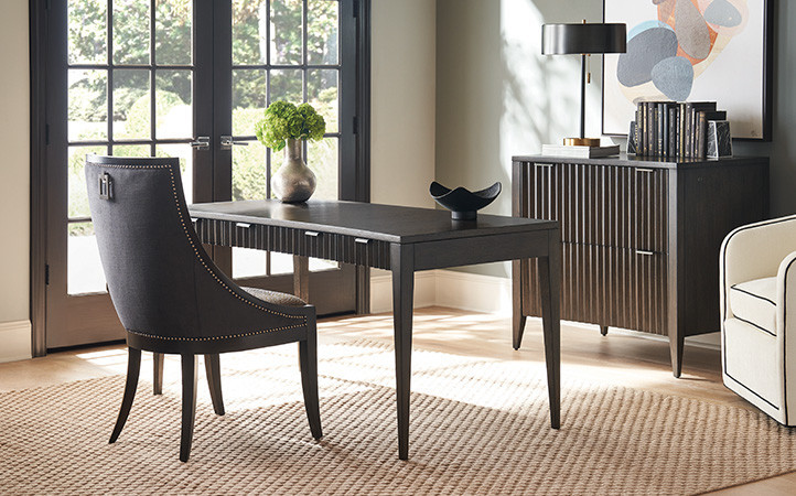 Office scene featuring a desk and file cabinet.