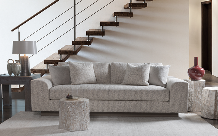 Artistica Upholstery scene featuring a sofa, and four accent tables