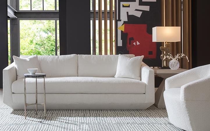 Artistica Upholstery scene featuring a sofa, two side tables, and a chair.