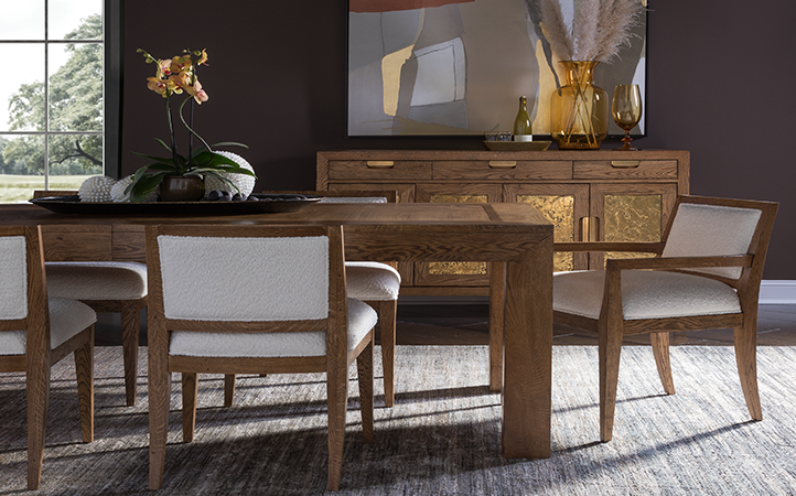 Barnaby dining scene featuring rectangular dining table, five dining chairs and a buffet.