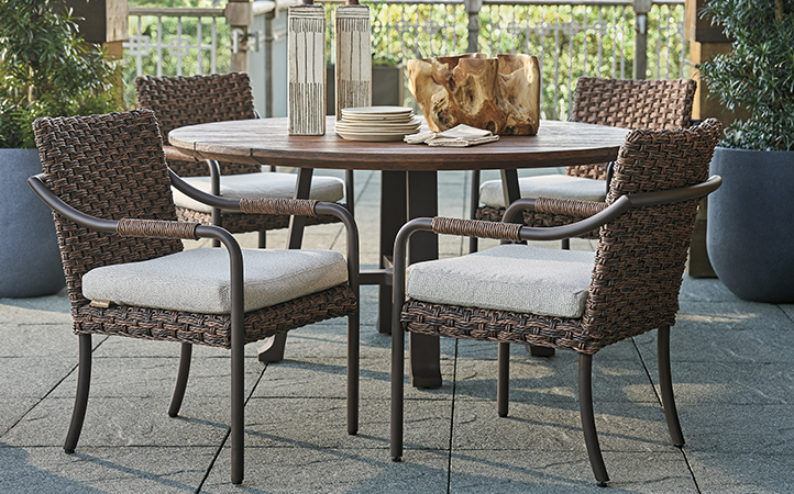 Kilimanjaro dining room scene featuring dining table with four chairs,