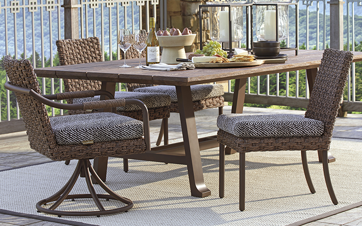 Kilimanjaro dining room scene featuring dining table with six chairs.