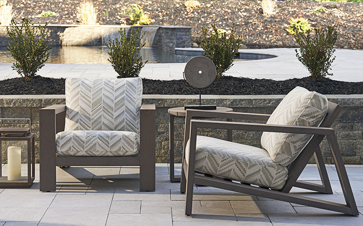 Mozambique living room scene featuring two chairs and an accent table.